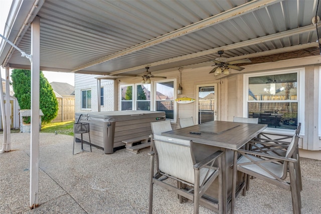 view of patio featuring a hot tub and ceiling fan