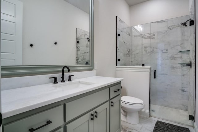 bathroom featuring vanity, toilet, and walk in shower