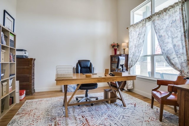 office space featuring light hardwood / wood-style floors