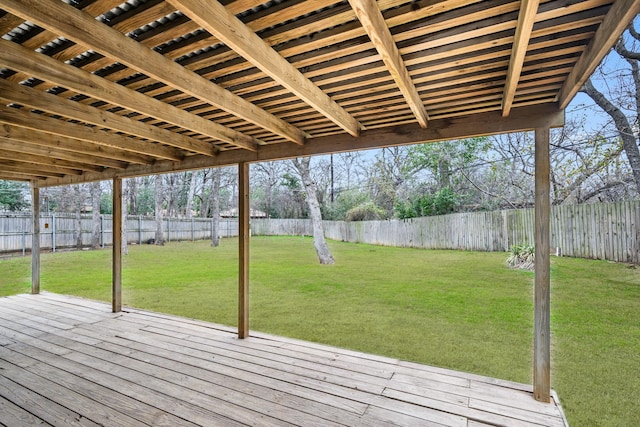 wooden terrace with a lawn