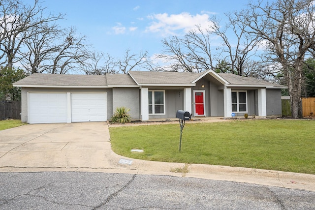 ranch-style house with a garage and a front yard