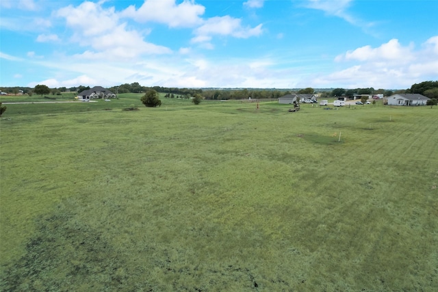 view of yard featuring a rural view