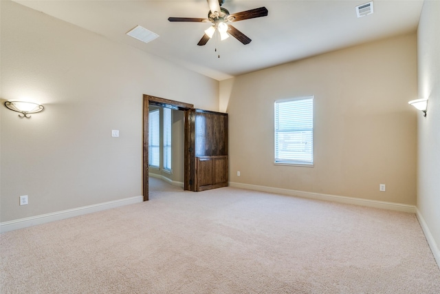 2605 Waterstone Ln, Rockwall, TX 75032 - unfurnished bedroom featuring light carpet, baseboards, and ceiling fan
