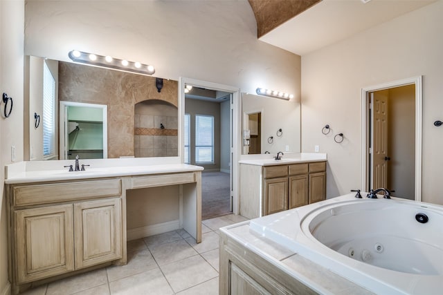 2605 Waterstone Ln, Rockwall, TX 75032 - bathroom featuring tile patterned flooring, a whirlpool tub, two vanities, and a tile shower