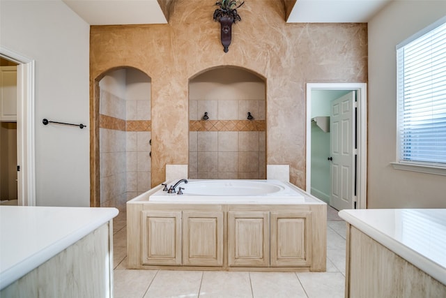 2605 Waterstone Ln, Rockwall, TX 75032 - bathroom with a bath, tile patterned flooring, and a tile shower