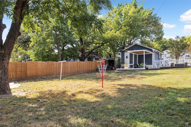 view of yard with a wooden deck