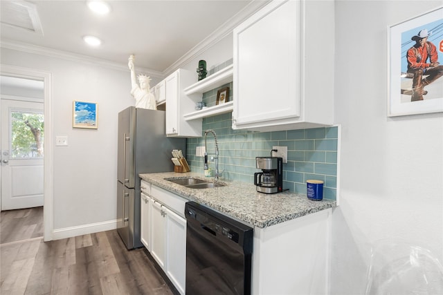 kitchen featuring sink, white cabinetry, black dishwasher, light stone counters, and decorative backsplash