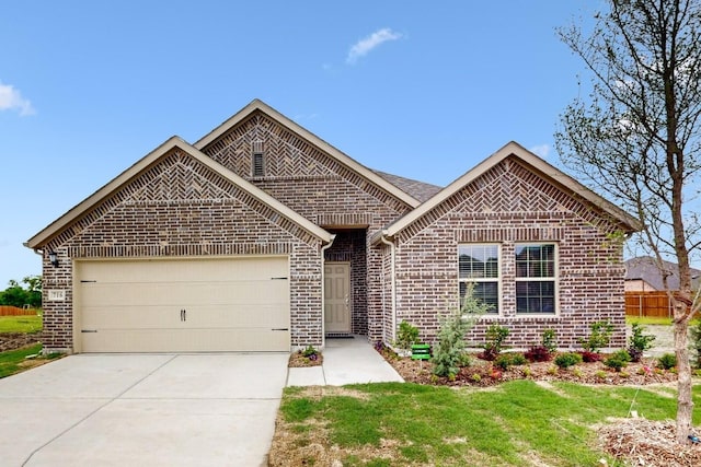 716 Tawny Turn, Lavon, TX 75166 - single story home featuring a garage, driveway, and brick siding
