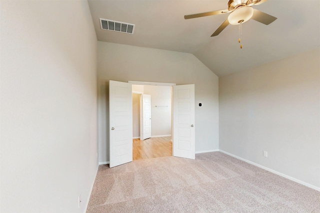 716 Tawny Turn, Lavon, TX 75166 - unfurnished room with ceiling fan, light colored carpet, baseboards, vaulted ceiling, and visible vents