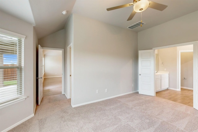 716 Tawny Turn, Lavon, TX 75166 - unfurnished bedroom with light colored carpet, baseboards, ceiling fan, and visible vents
