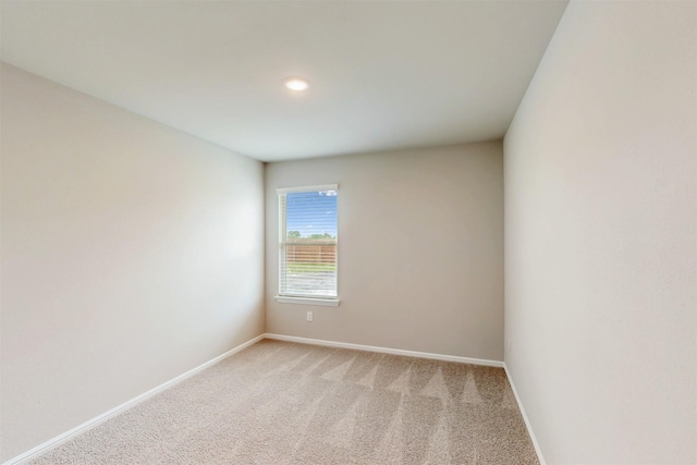 716 Tawny Turn, Lavon, TX 75166 - unfurnished room with baseboards, recessed lighting, and light carpet