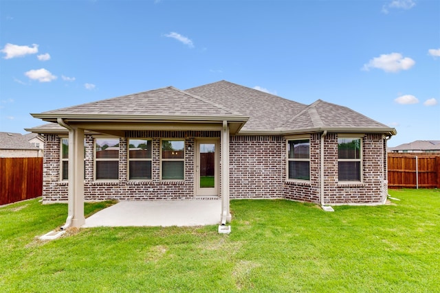 716 Tawny Turn, Lavon, TX 75166 - back of house with a yard, brick siding, fence private yard, and a patio area