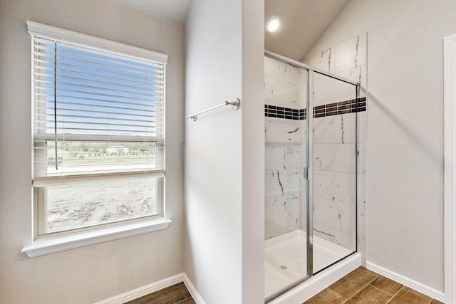 721 Merry Summit Rd, Lavon, TX 75166 - full bath with healthy amount of natural light, a stall shower, and wood finished floors