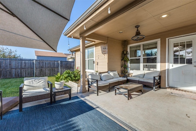 view of patio / terrace featuring ceiling fan and outdoor lounge area