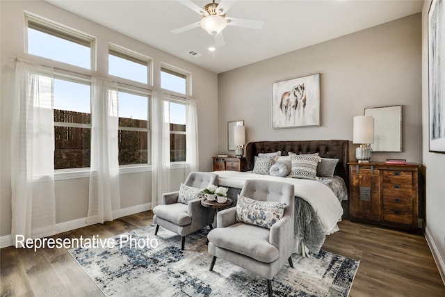 bedroom featuring dark hardwood / wood-style floors and ceiling fan