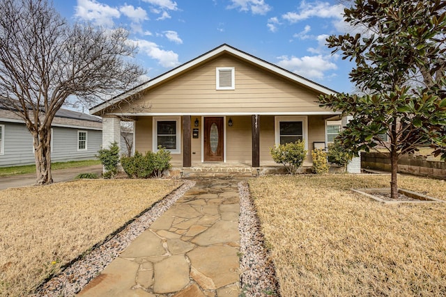 bungalow-style house featuring covered porch