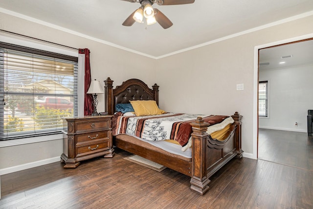 bedroom featuring ornamental molding, dark hardwood / wood-style floors, and ceiling fan