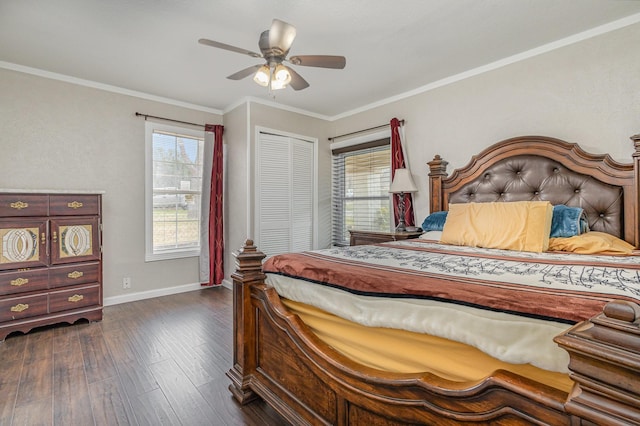 bedroom featuring a closet, ornamental molding, dark hardwood / wood-style flooring, and multiple windows