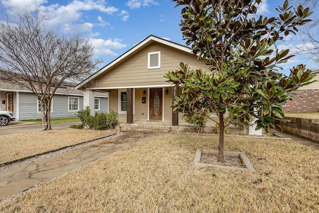 view of front facade with a porch and a front yard