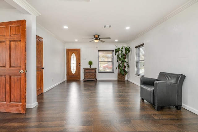 unfurnished room featuring dark hardwood / wood-style flooring, crown molding, and ceiling fan