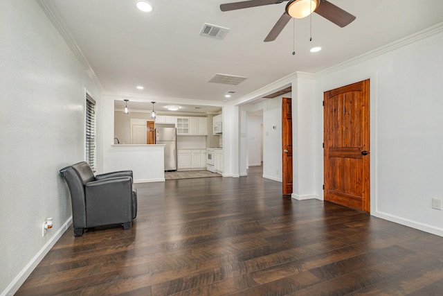 unfurnished living room featuring ceiling fan, ornamental molding, and dark hardwood / wood-style floors