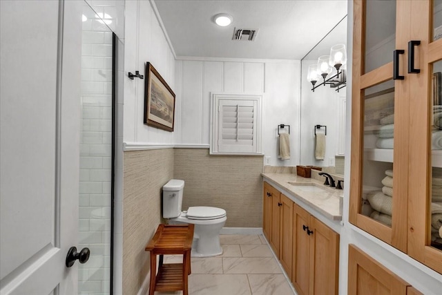 bathroom with vanity, walk in shower, a chandelier, and toilet