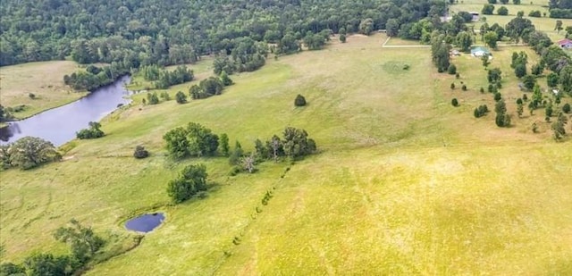 aerial view with a water view and a rural view