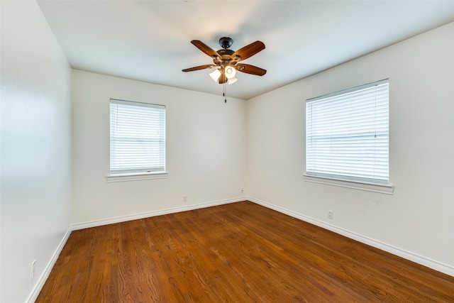 unfurnished room featuring hardwood / wood-style floors and ceiling fan