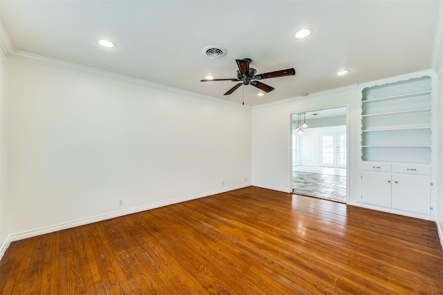 unfurnished room featuring french doors, ceiling fan, ornamental molding, and wood-type flooring