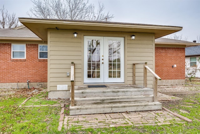 doorway to property featuring french doors