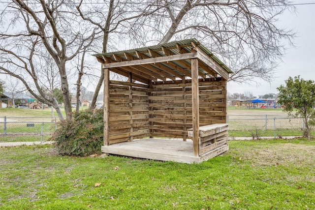 view of outdoor structure with a yard