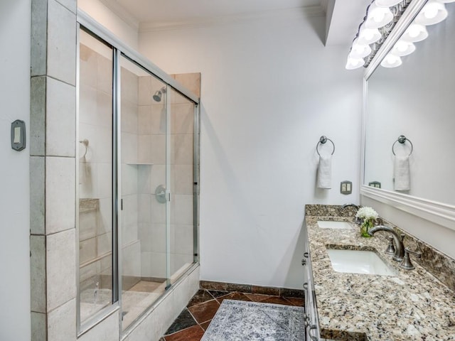 bathroom featuring vanity, crown molding, and walk in shower