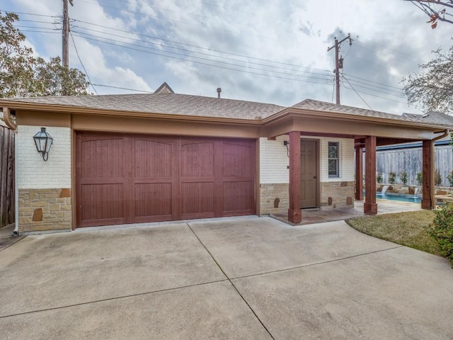 ranch-style home with a garage