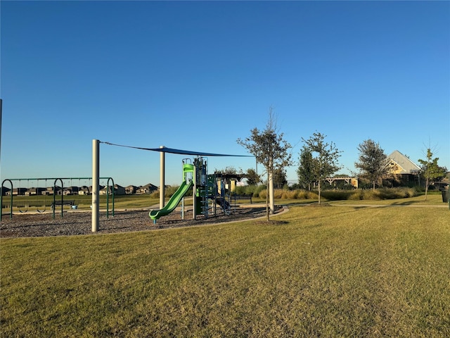 view of playground with a yard