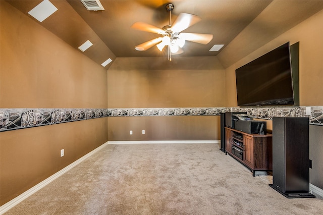 unfurnished room featuring ceiling fan, lofted ceiling, and light carpet