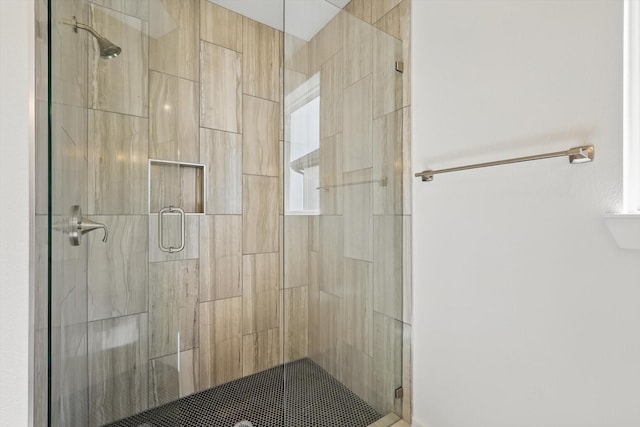 bathroom with a stall shower