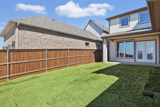 view of yard featuring a fenced backyard