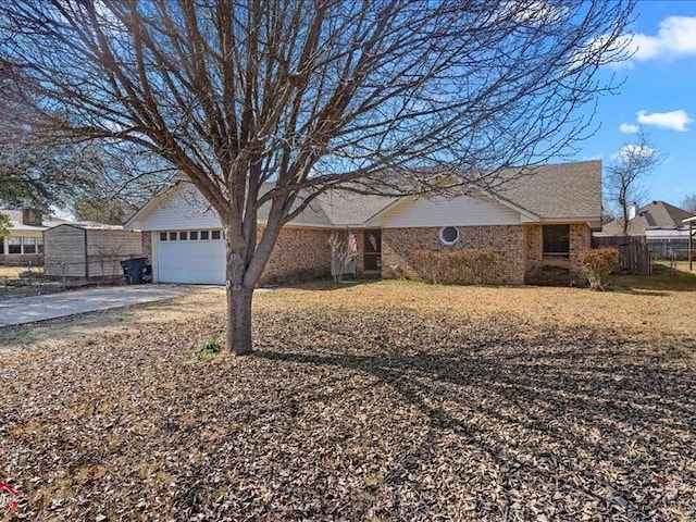 ranch-style home with a garage