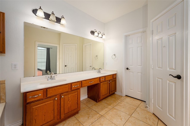 bathroom featuring vanity and tile patterned flooring