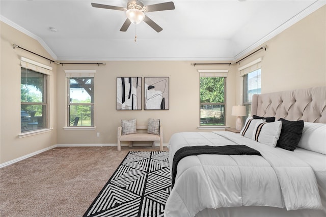 carpeted bedroom featuring multiple windows, ornamental molding, and lofted ceiling