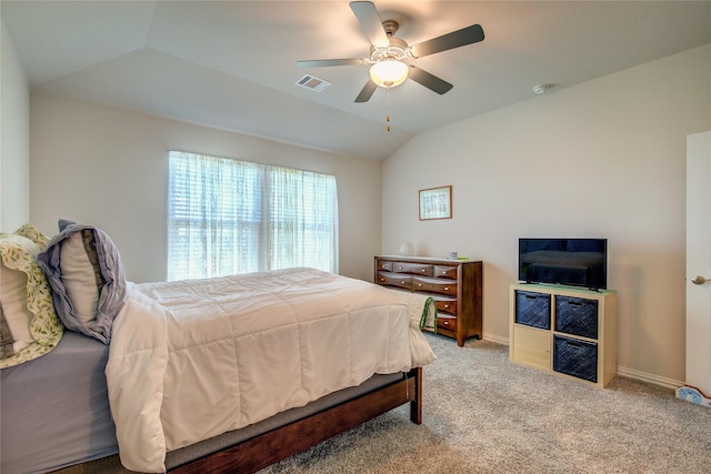 carpeted bedroom with lofted ceiling and ceiling fan