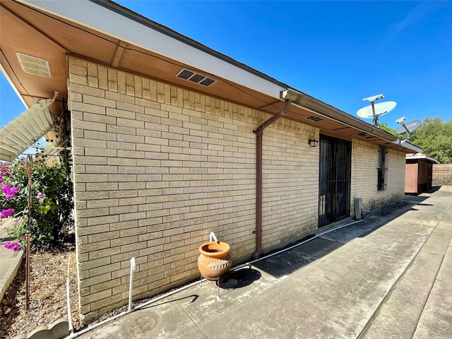 view of home's exterior with a patio area