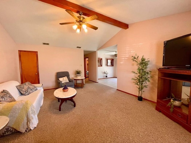 sitting room with vaulted ceiling with beams, light colored carpet, and ceiling fan