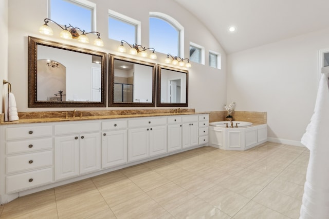 bathroom featuring vanity, vaulted ceiling, and plus walk in shower