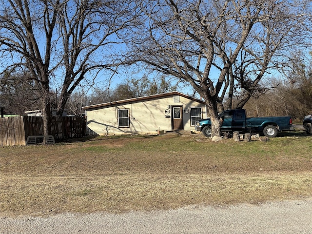 view of property exterior featuring a yard