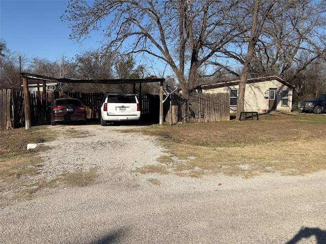 exterior space featuring a carport