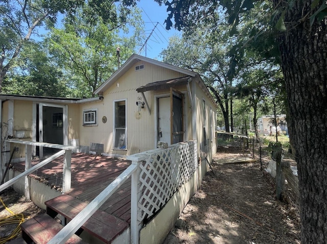 view of front of home with a deck