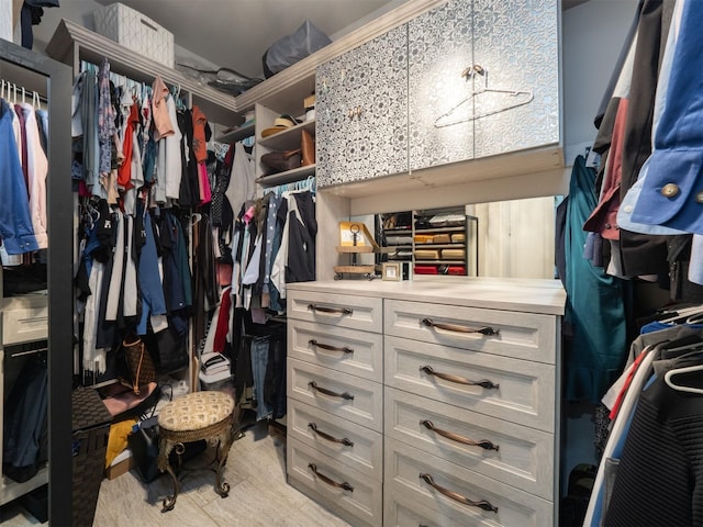 walk in closet featuring light wood-type flooring