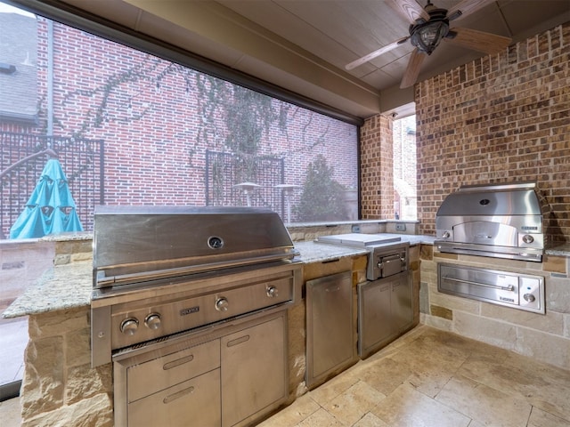 view of patio / terrace featuring ceiling fan and area for grilling