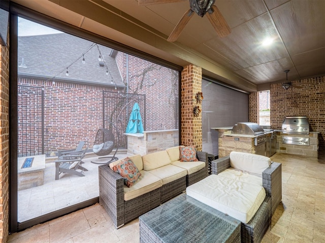 view of patio featuring ceiling fan, area for grilling, grilling area, and an outdoor hangout area